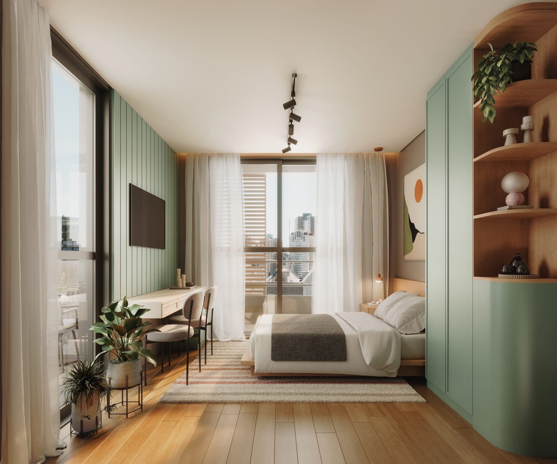 Studio decorado do Âmbar (unidade 503) com painel verde e mesa de trabalho
